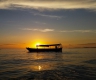 Sunset on boat on Tonlé Sap lake